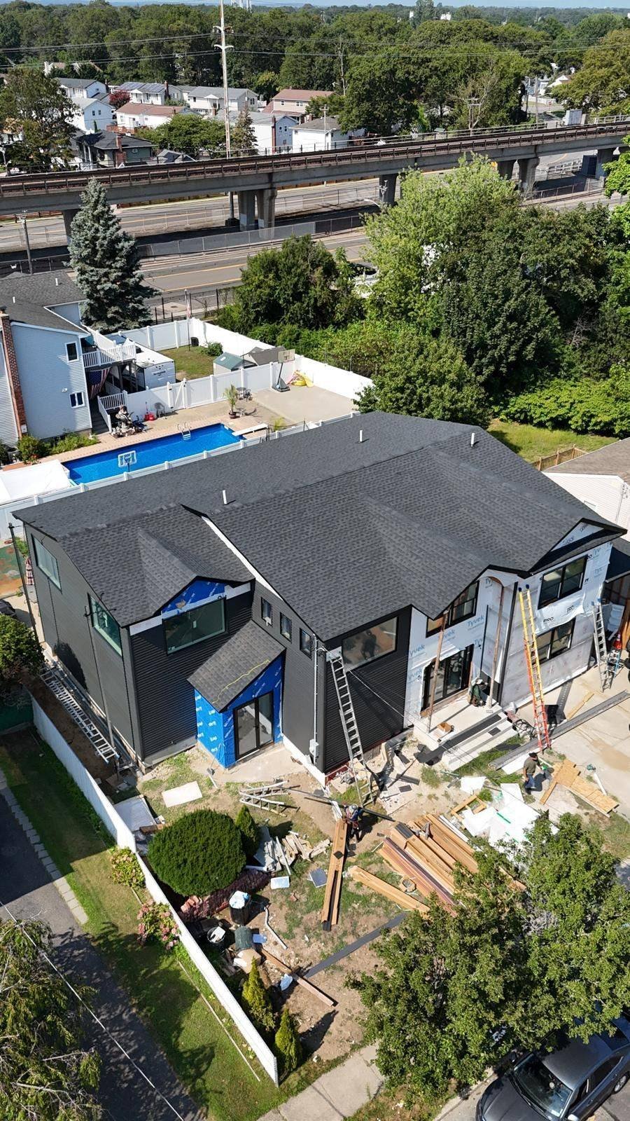 Roof and exterior project by Top Pros Construction on Long Island